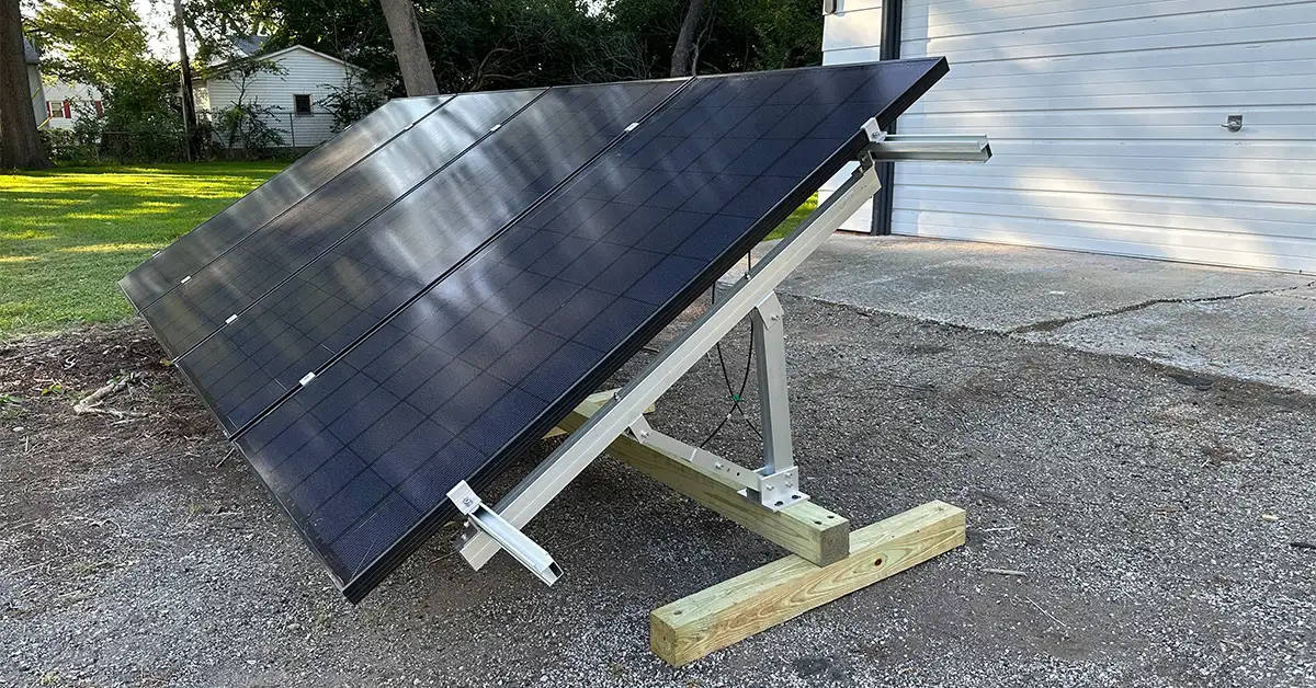 An image of four solar panels mounted on an EG4 Bright Mount solar ground mount.