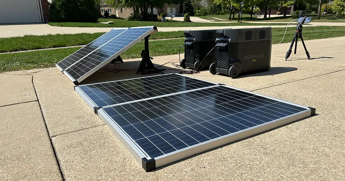 An image showing a flat solar panel setup and an angled solar panel setup, each wired to an EcoFlow Delta Pro.