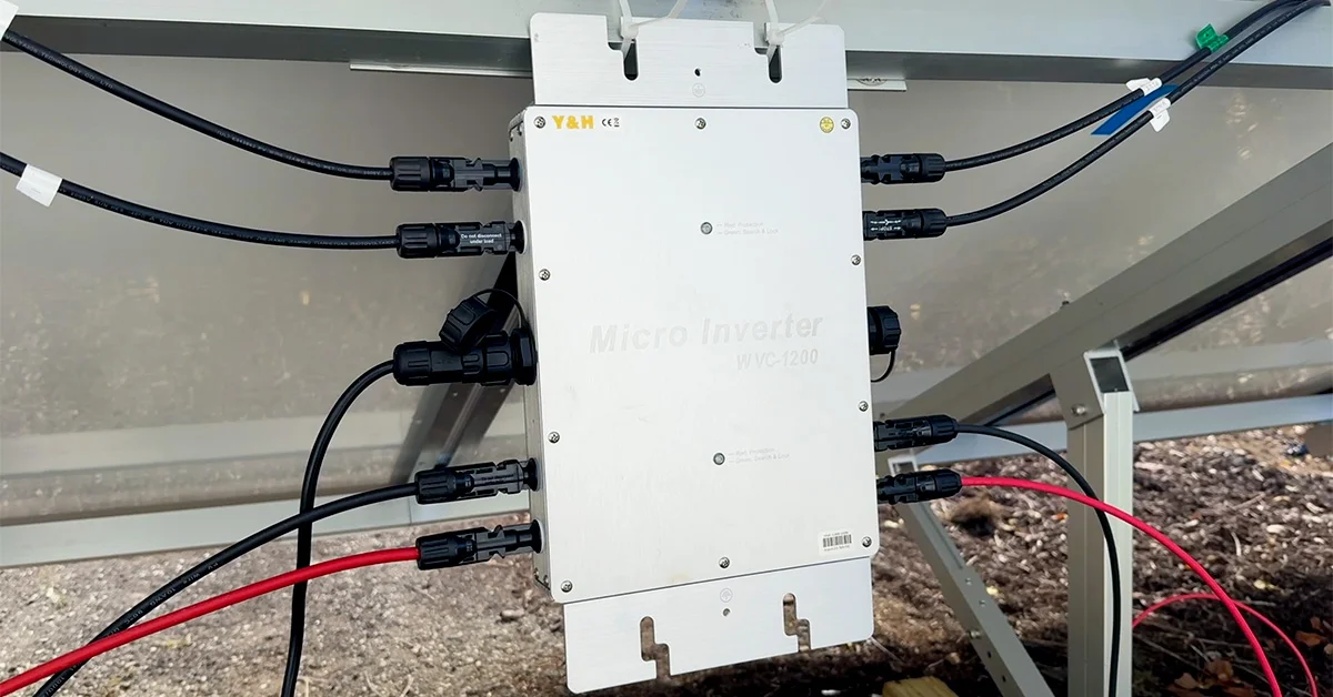 An image of a Solar Grid Tie Micro Inverter hooked up to four solar panels.